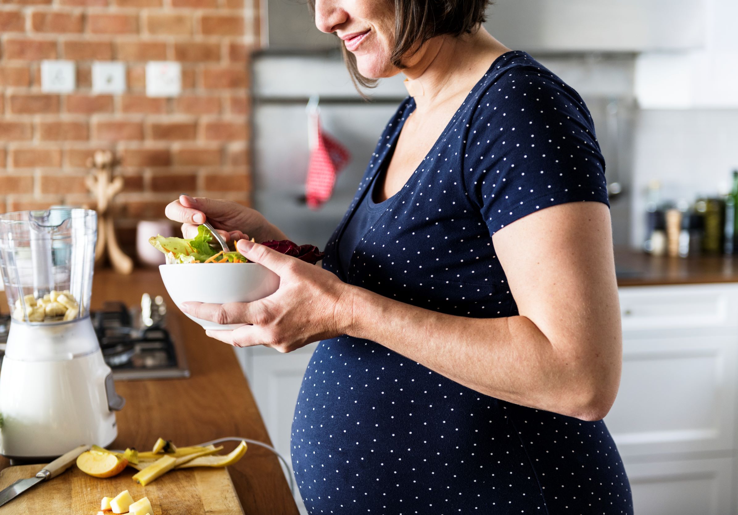 Pregnant woman eating